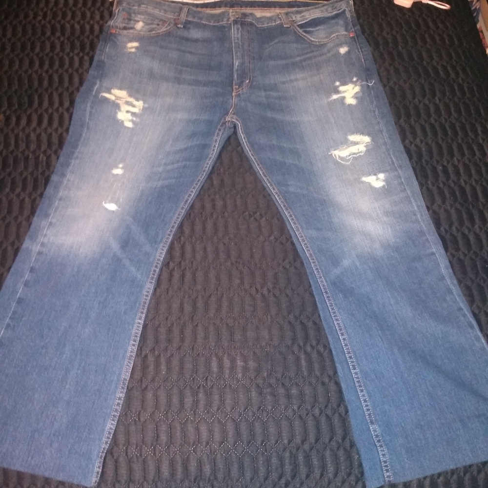 Levi's 527 light wash distressed jeans